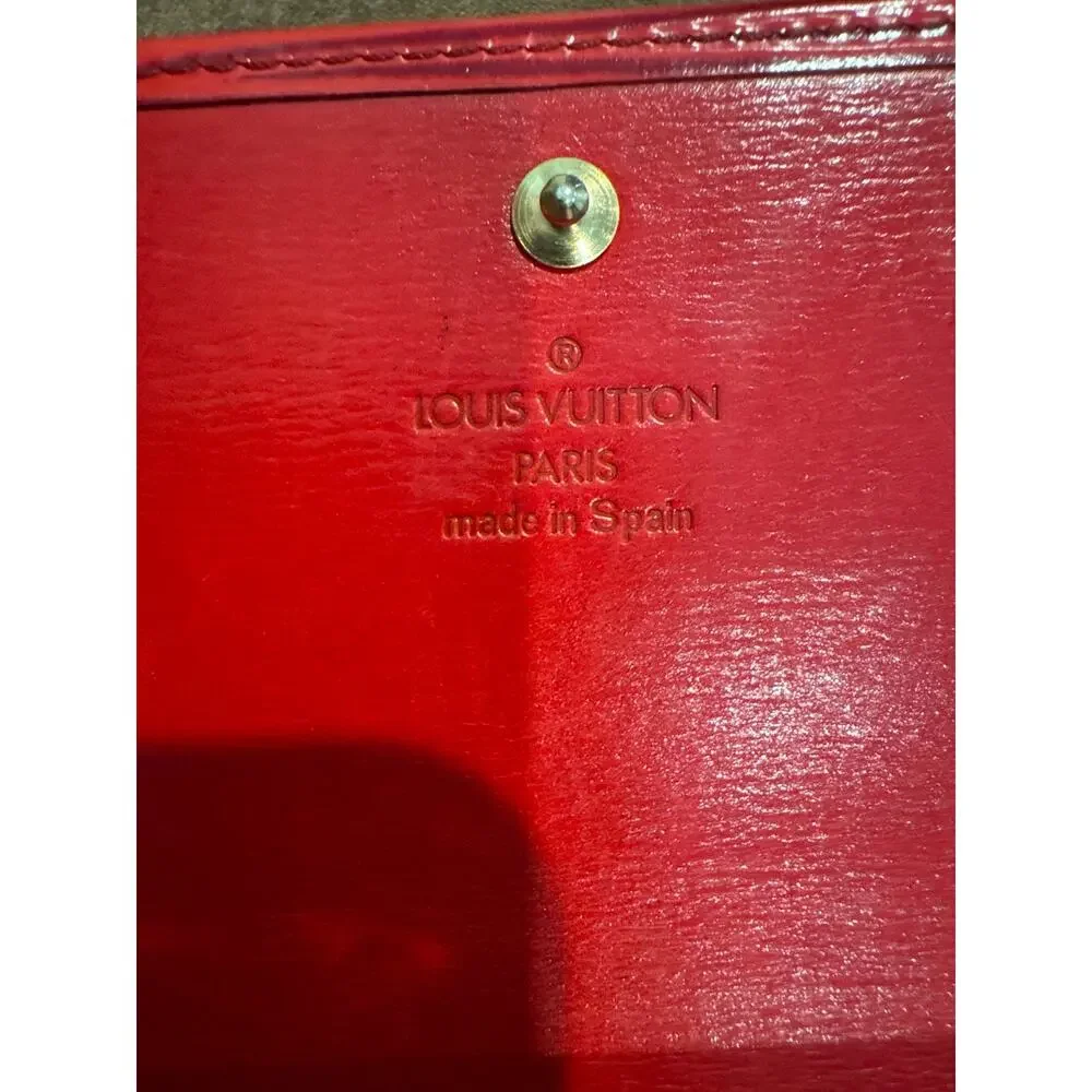Louis Vuitton Epi International Wallet in Castilian Red